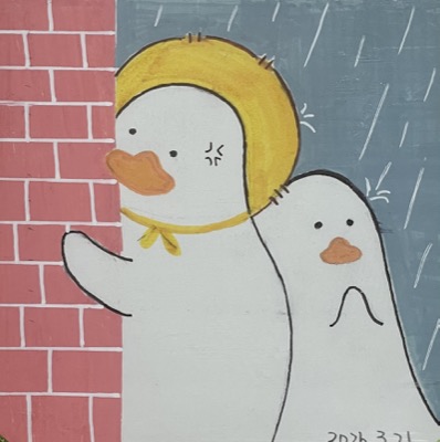 Ducks hiding behind wall